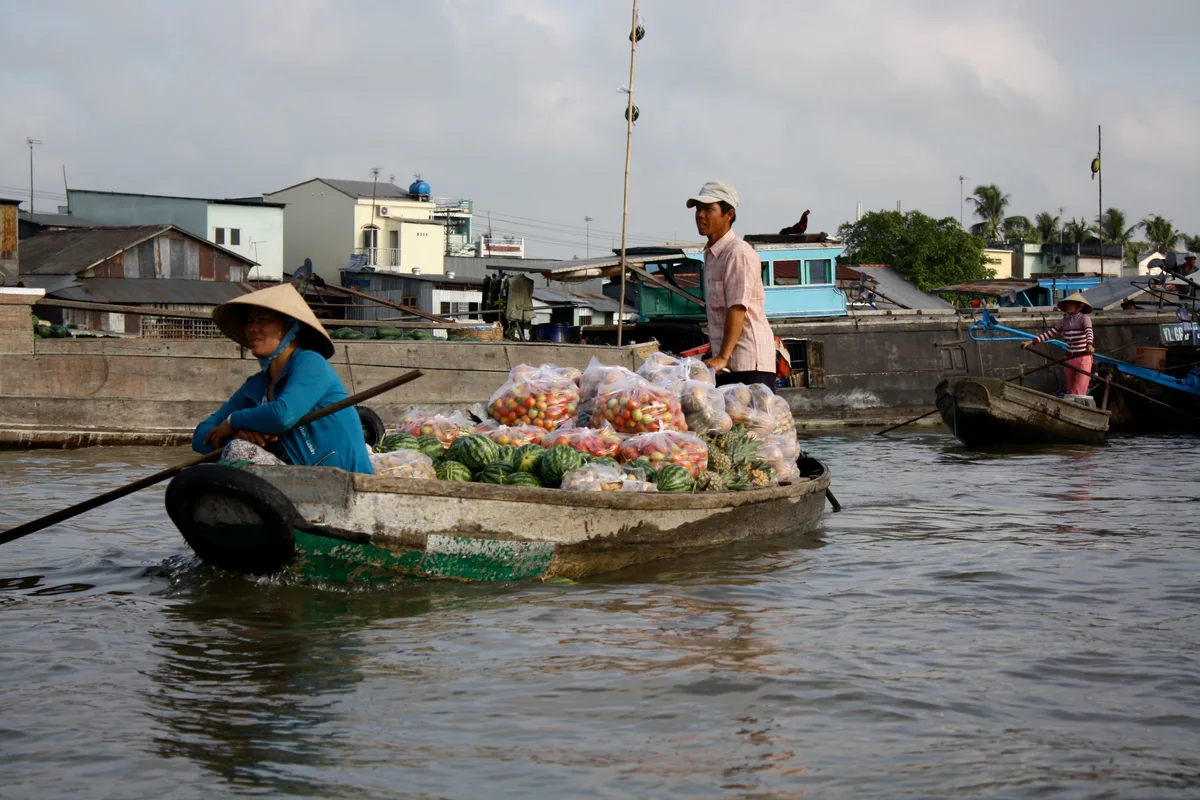 Produce boats gathering at Cai Rang floating market near Can Tho in the early morning