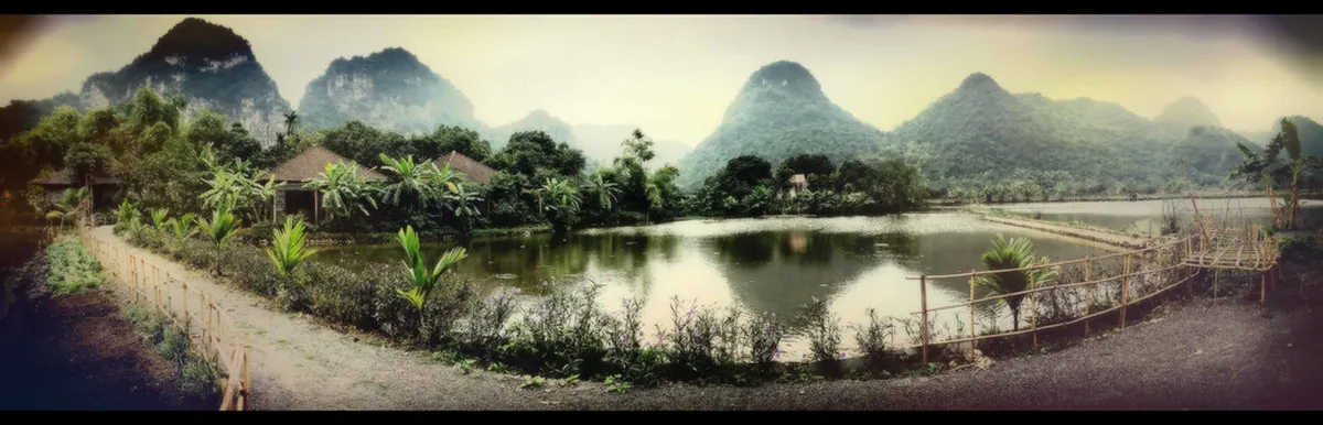 Tam Coc Garden Hotel grounds with Amazing Backdrop!, illustrating How to Get Around Ninh Binh in this Vietnam travel guide