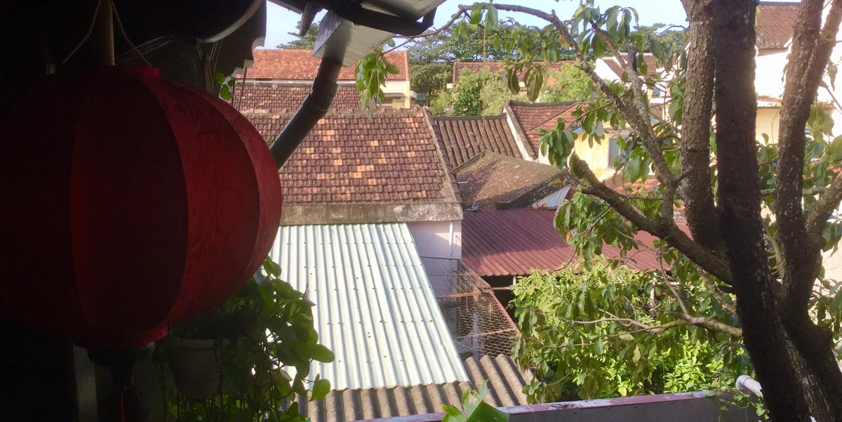 Traditional tiled rooftops and guesthouses across Hoi An Ancient Town